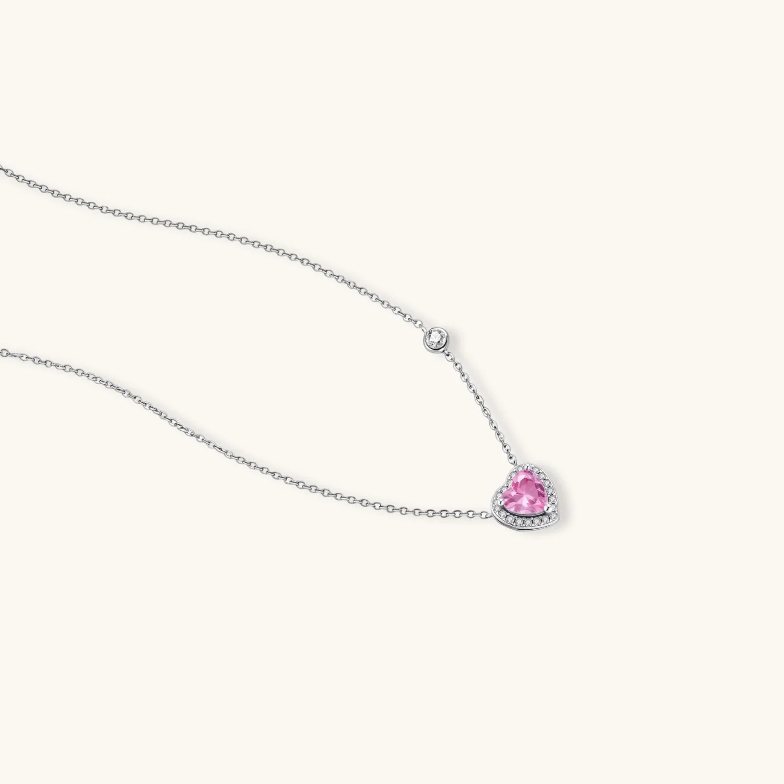 Pink heart-shaped cubic zirconia jewelry set with white gold plating featuring necklace, earrings, bracelet and ring