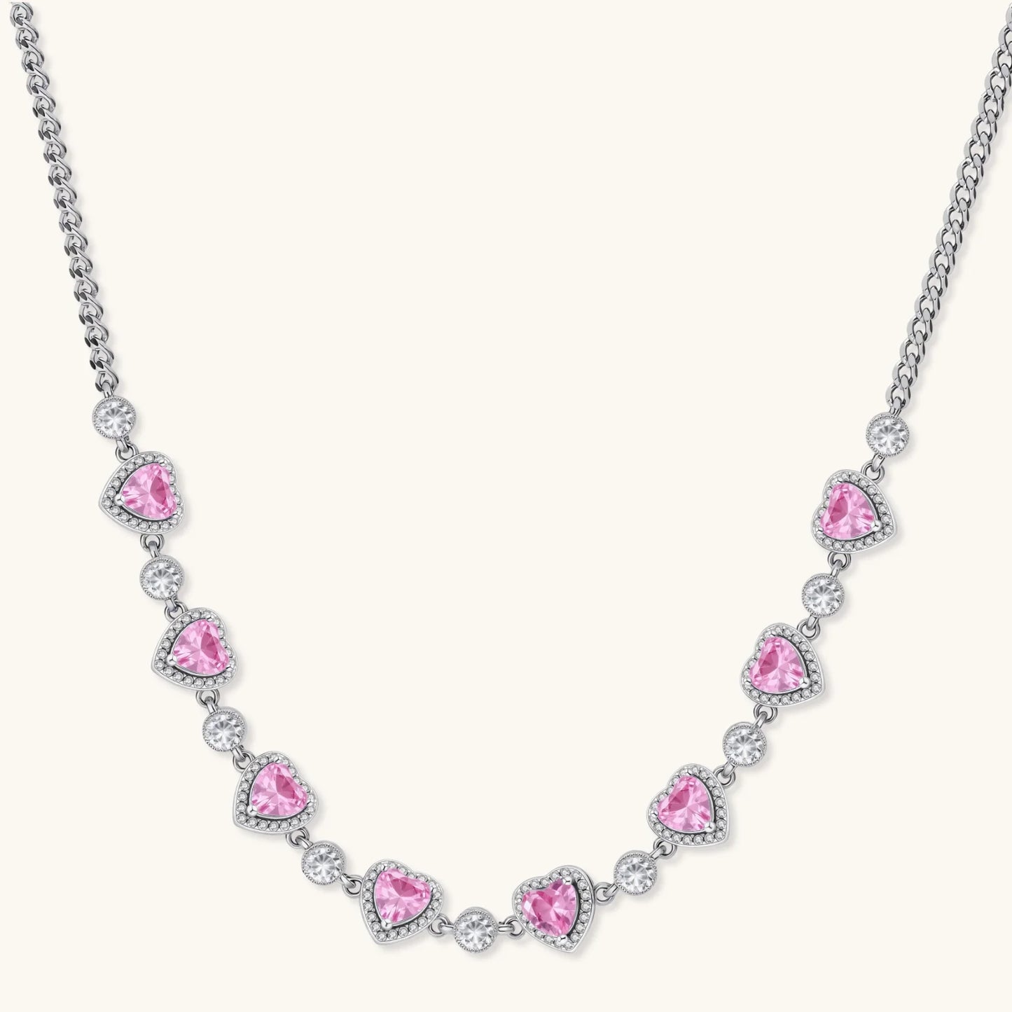 Pink heart-shaped cubic zirconia jewelry set with white gold plating featuring necklace, earrings, bracelet and ring