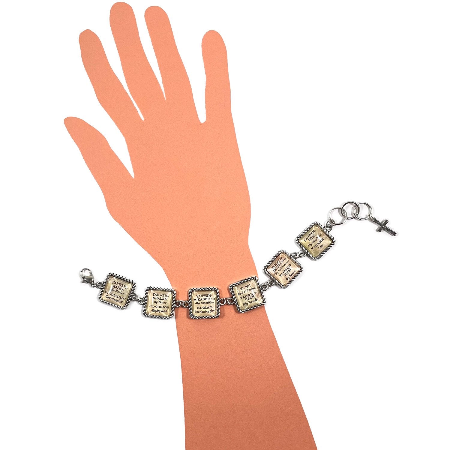 Bracelet with decorative elements on a hand model against a white background