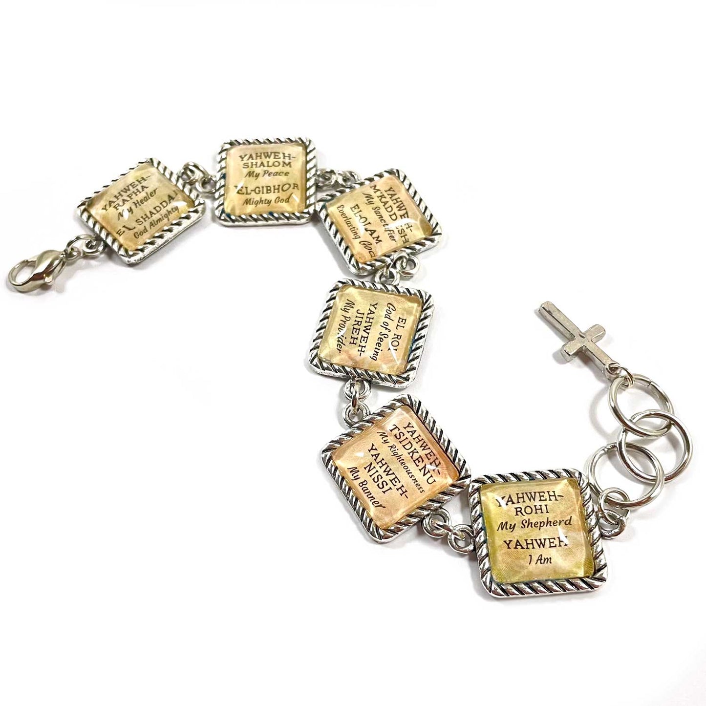 Bracelet with religious text charms on a white background