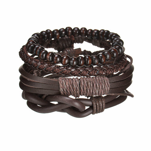Stack of brown leather and beaded bracelets on a white background
