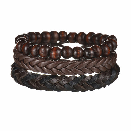 Three brown leather bracelets with braided design on a white background