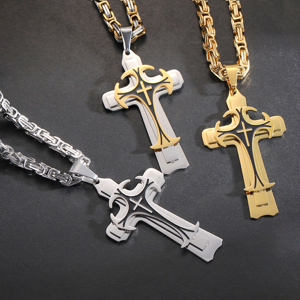 Two cross necklaces, one silver and one gold, on a dark background.