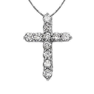 Diamond cross pendant on a white background