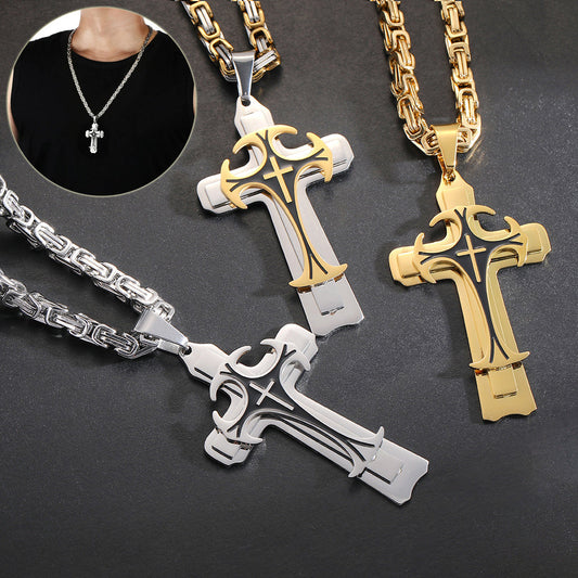 Two cross necklaces, one silver and one gold, on a dark surface.
