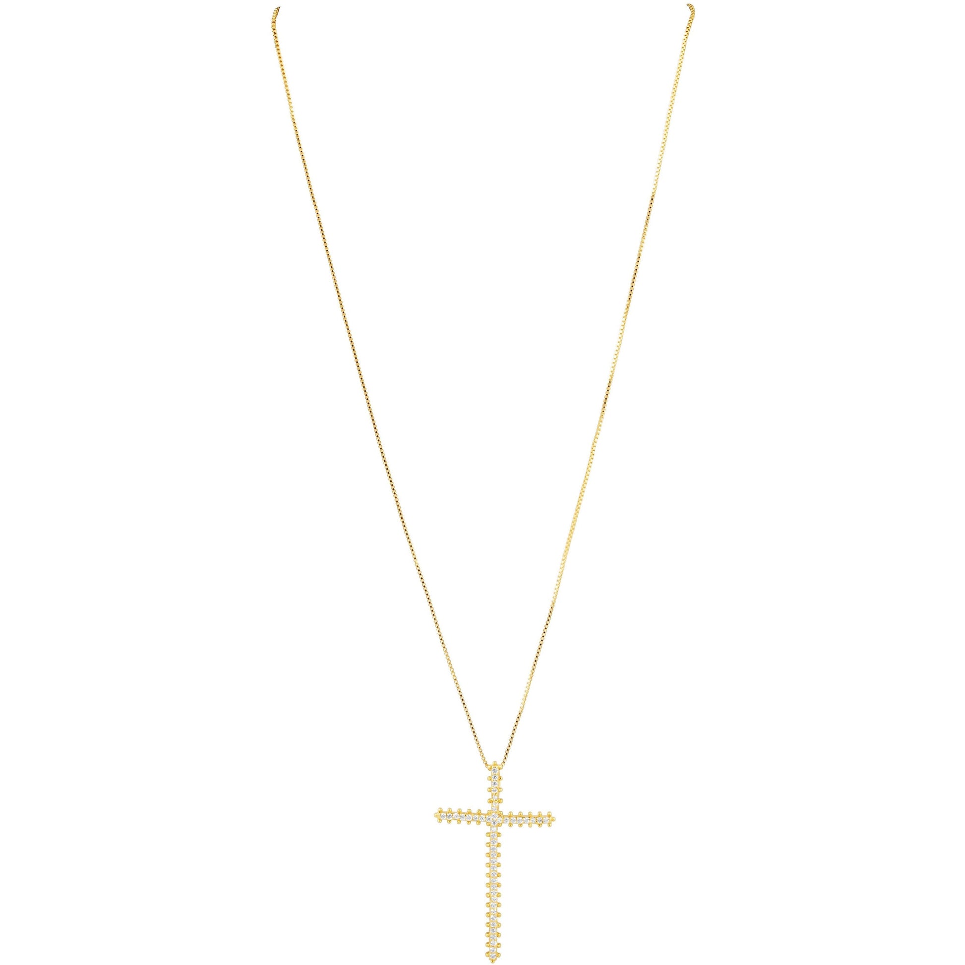 Gold cross necklace on a white background