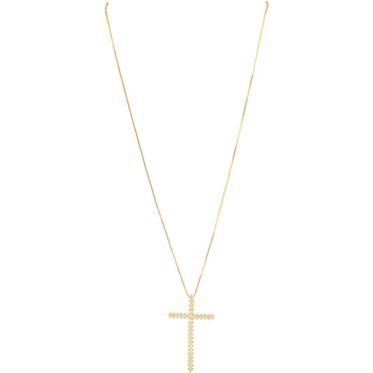Gold cross necklace on a white background